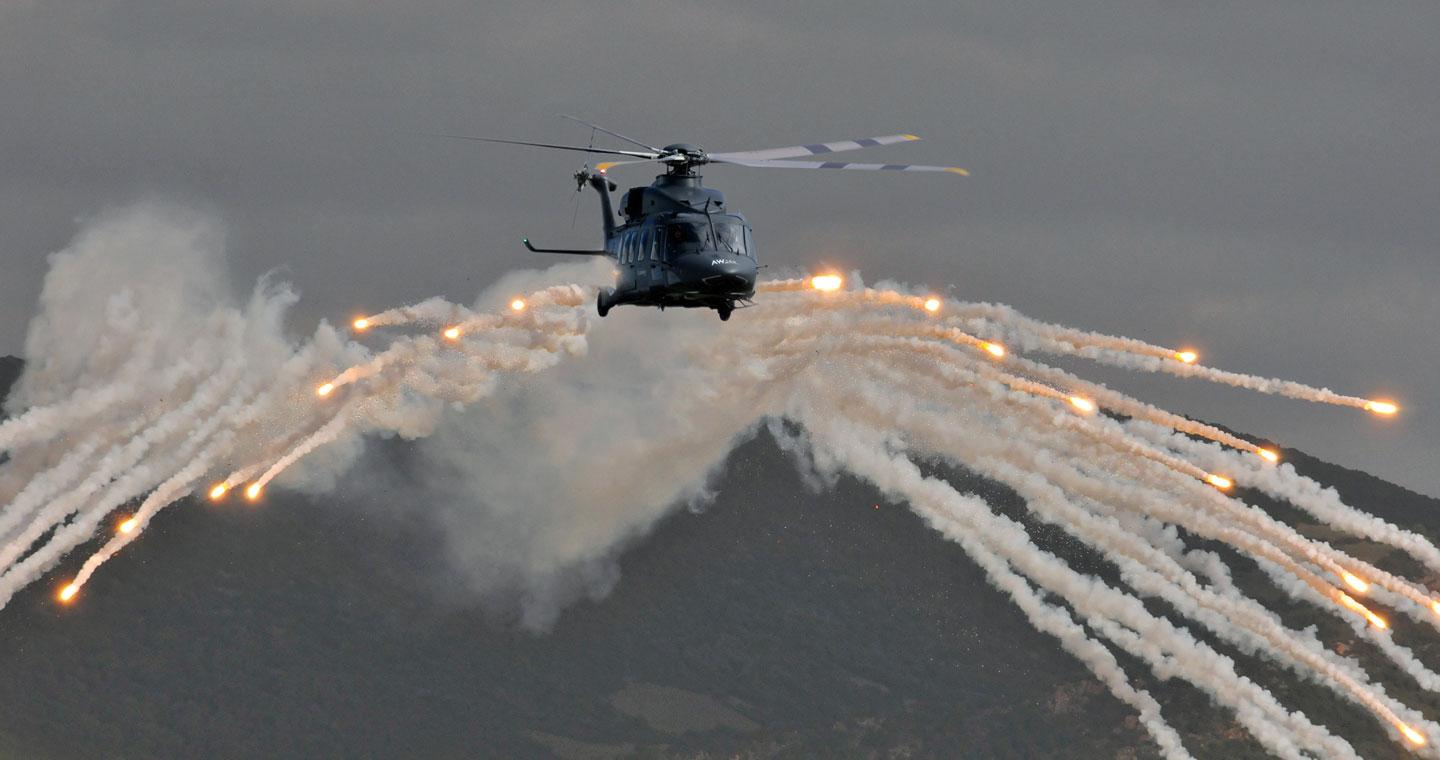 AW149 helicopter releasing chaff and flare
