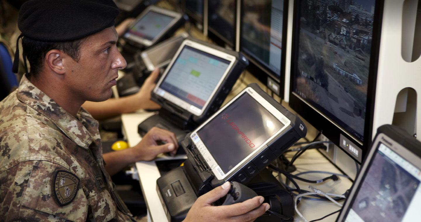 Military intelligence officer checking screens