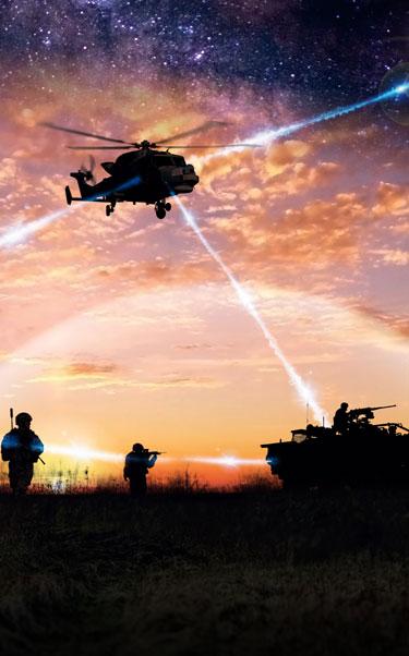 Silhouette of soldiers, helicopter and tank on a battlefield