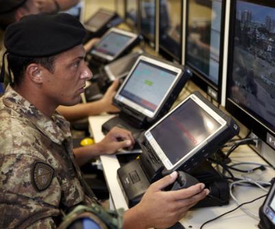 Intelligence officer monitoring screens