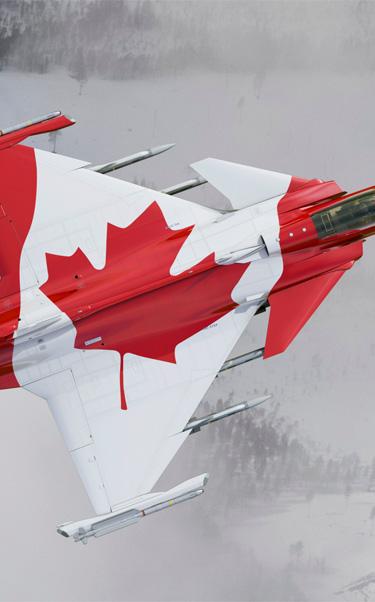 Canadian Gripen E fighter aircraft in flight