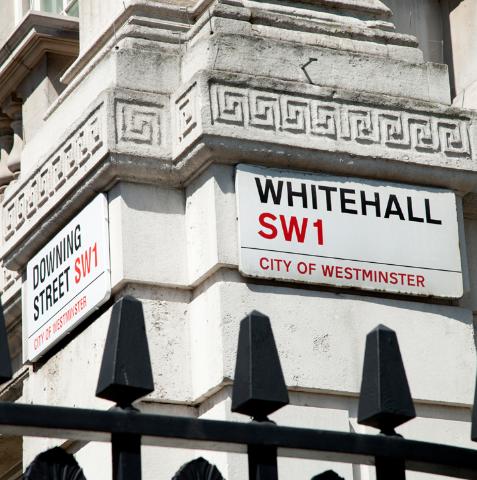 Corner of Whitehall with sign showing Whitehall and Downing Street