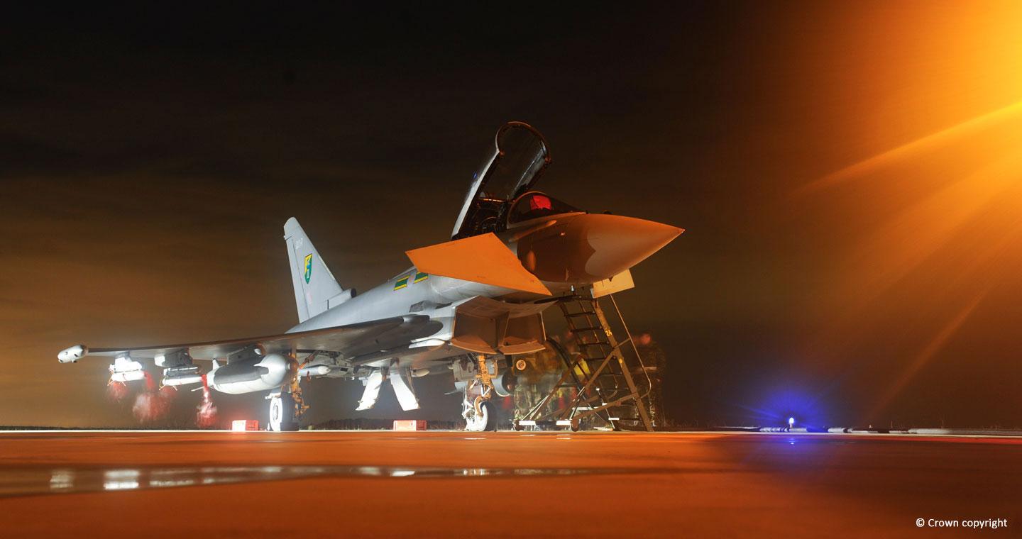Eurofighter Typhoon being prepared for take-off at night time