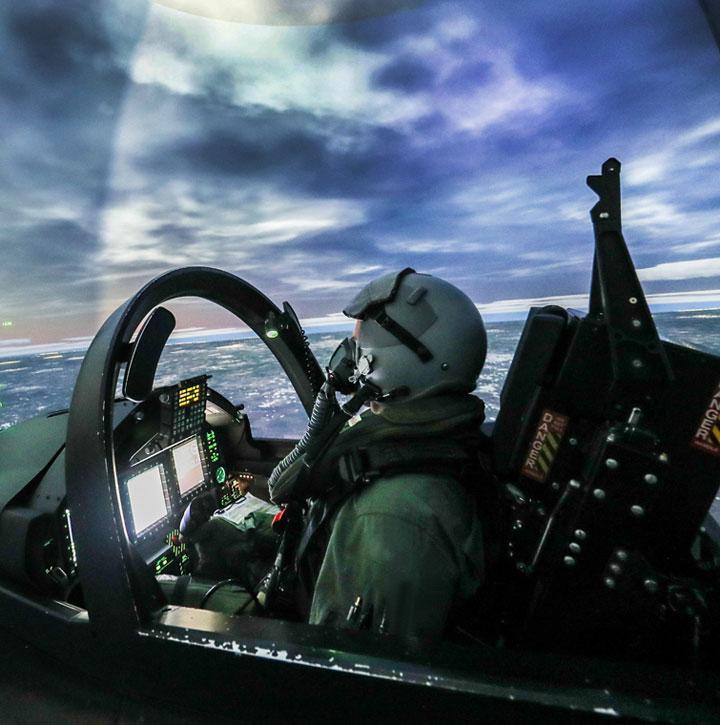 Pilot in cockpit simulator