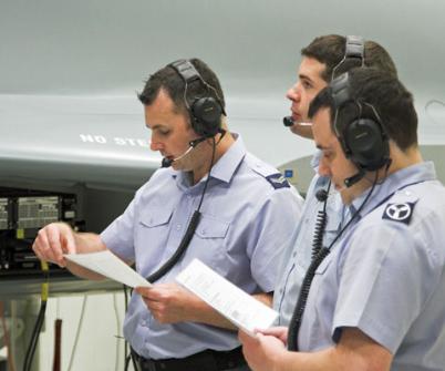 Group of Royal Air Force engineering cadets being trained on propulsion systems